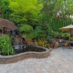 hardscaping and softscaping come together to form gorgeous landscape for winter garden fl home
