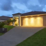 A house with lighting at dusk in Orlando, FL