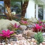 Hardscape design used to highlight vibrant and colorful flowers