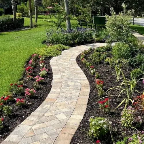 Beautiful commercial walkway landscape design by Grasshoppers in the in the greater Orlando area