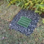 clean and attractive finished french drain after catch basin installation in Orlando