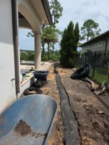 in the middle of a french drain installation at a Central Florida house