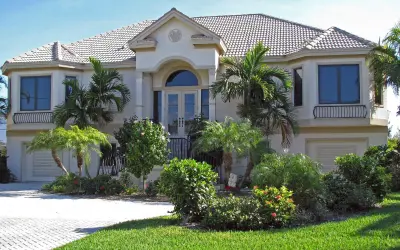 A newly landscaped Florida yard. Learn from the pros at Grasshoppers and avoid these common mistakes with your landscape renovation project.