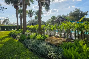 A neatly landscaped yard in an HOA community. Contact Grasshoppers if you're looking for lawn maintenance and landscaping for your HOA community in Florida.